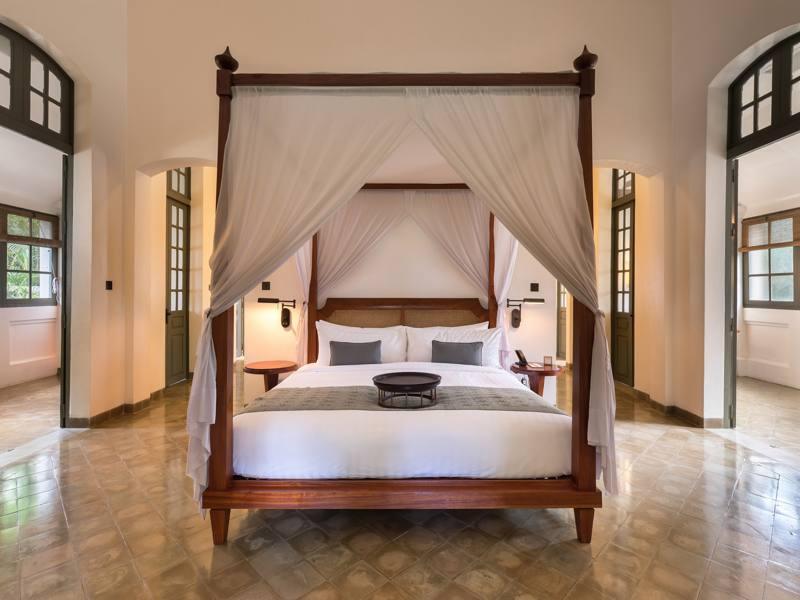 Canopy bed of Amantaka Suite in Amantaka luxury Resort & Hotel in Luang Prabang Laos.jpg